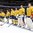MALMO, SWEDEN - DECEMBER 28: Sweden's Oscar Dansk #35 and teammates look on during the national anthem after a preliminary round win over Finland at the 2014 IIHF World Junior Championship. (Photo by Andre Ringuette/HHOF-IIHF Images)